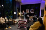 A student performing a reading at Firewater