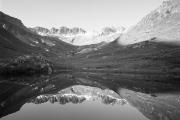 Black and white photograph of the valley of a canyon