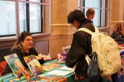 Emerson Student engaging with a Barefoot Books representative about career opportunities at the publishing house during the Career Fair