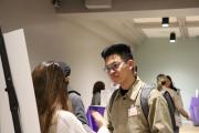 Emerson student listening to an employer at Internship Launch