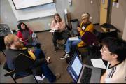 students sit in a circle