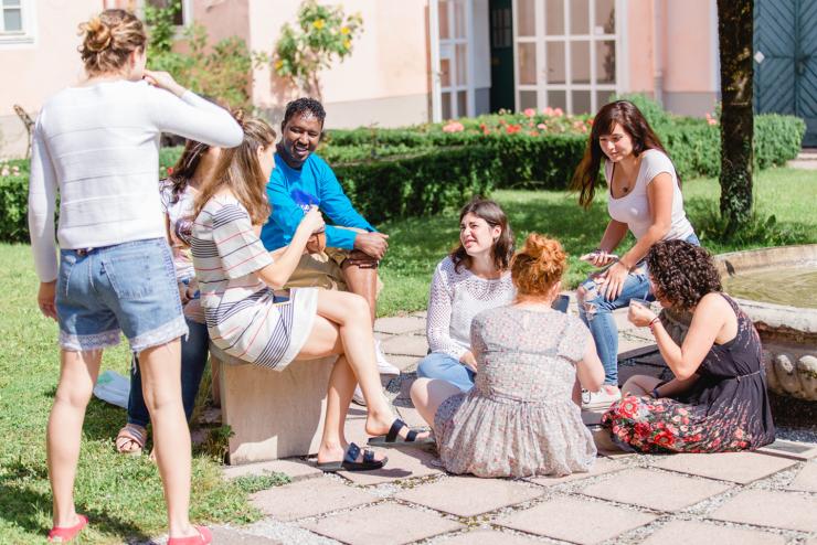 A group of students hanging out in a courtyard