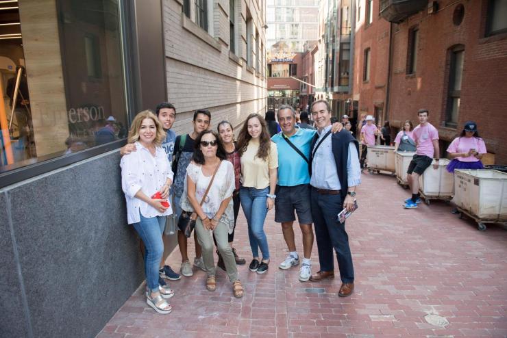 Group of smiling students and family members in Boylston Alley