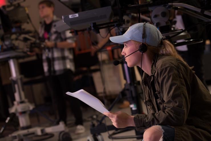 Student producing show in Tufte television studio