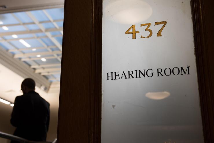 Door that says 437 Hearing Room
