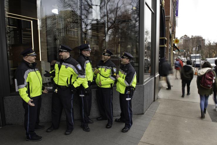 The Emerson College Police Department standing outside of the Dining Center
