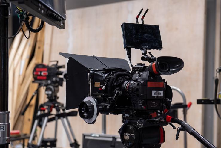 A professional camera and other equipment on a film set