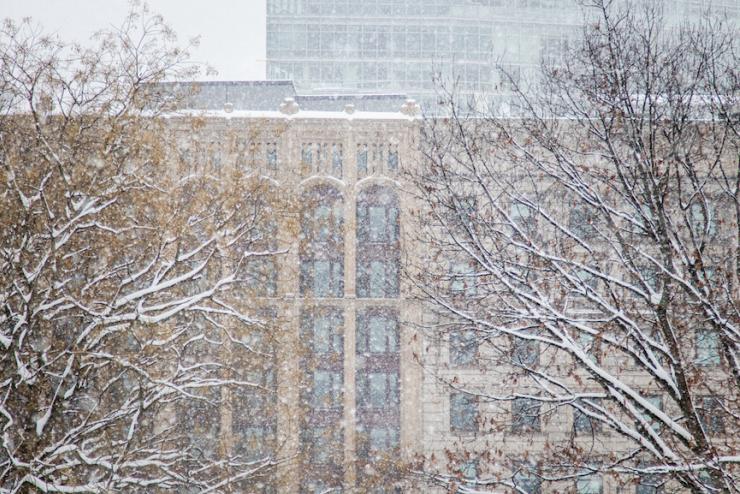 A photo of an Emerson building during snowfall