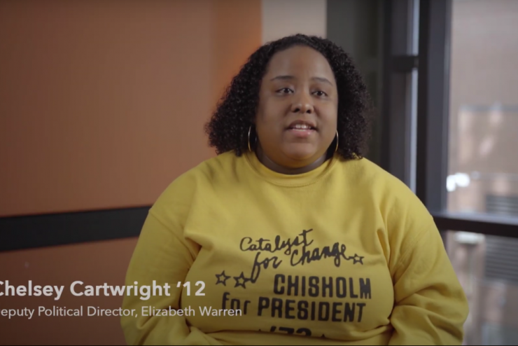 Video still of alumna Chelsey Cartwright ‘12 talking about her experience working as Deputy Political Director for Elizabeth Warren