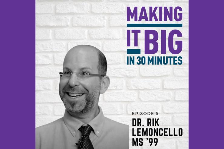 Dr. Rik Lemoncello posing next to the "Making It Big" logo