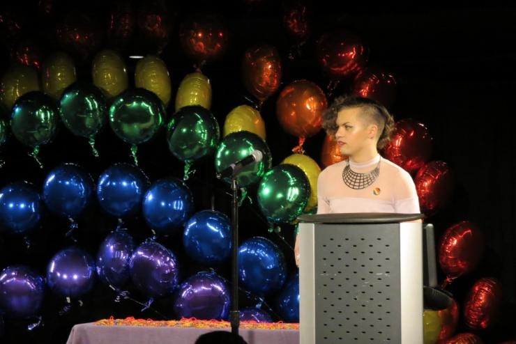 Student speaking at LGBTQIA+ Lavender graduation ceremony