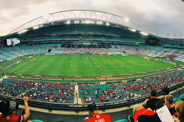 A wide shot of a soccer stadium during a game