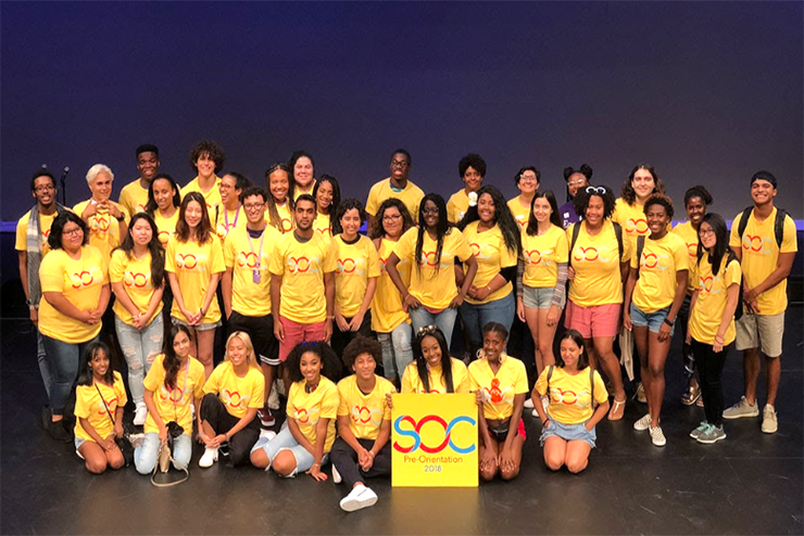 Students wearing matching yellow t-shirts during the Student of Color Pre-Orientation
