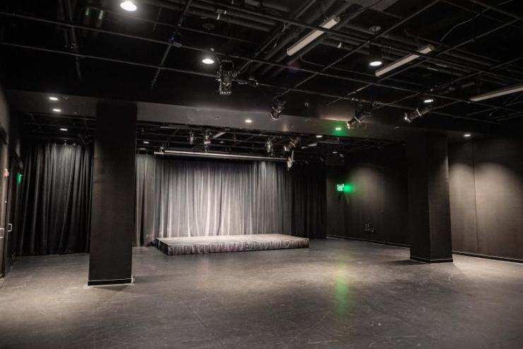 A lit photograph of the inside of the Student Performance Center