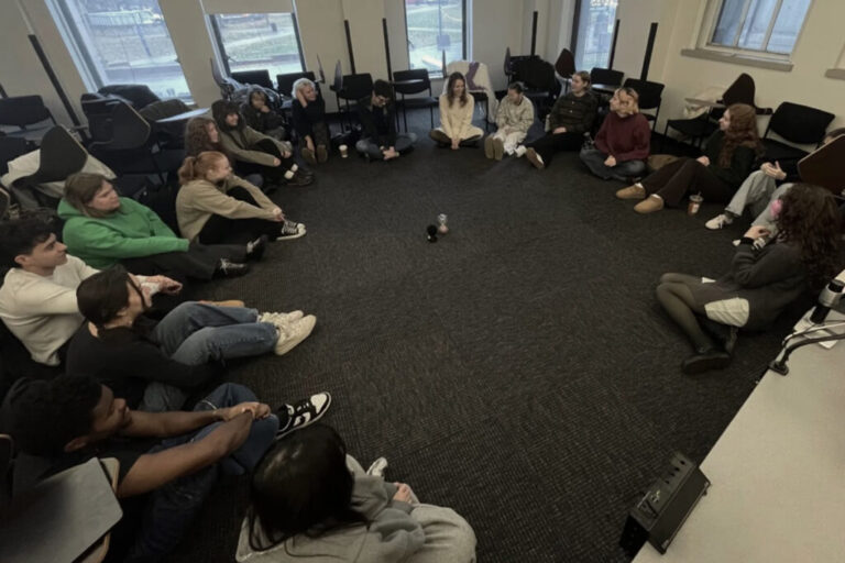 Students in David Kishik's Study Studies class discuss the week's readings around an hourglass. Photo courtesy of David Kishik/formoflife