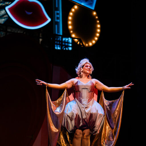 Emily Barnett '26 as the Good Fairy in Emerson Stage's Sweet Charity production. (Photo by Chris McIntosh)