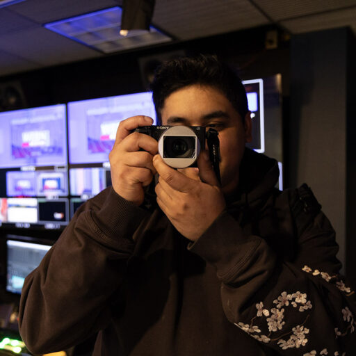 Marcos Quinones with a camera