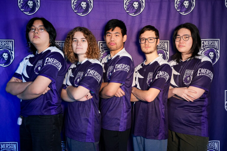Five members of Emerson Esports League of Legends team in uniform.