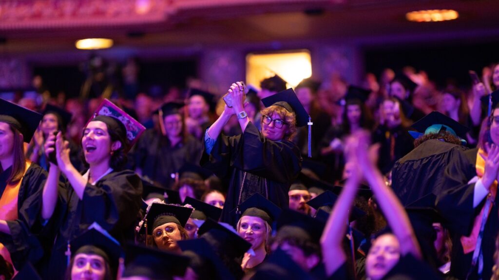 Undergraduate students cheering from their seats|||||||||||||