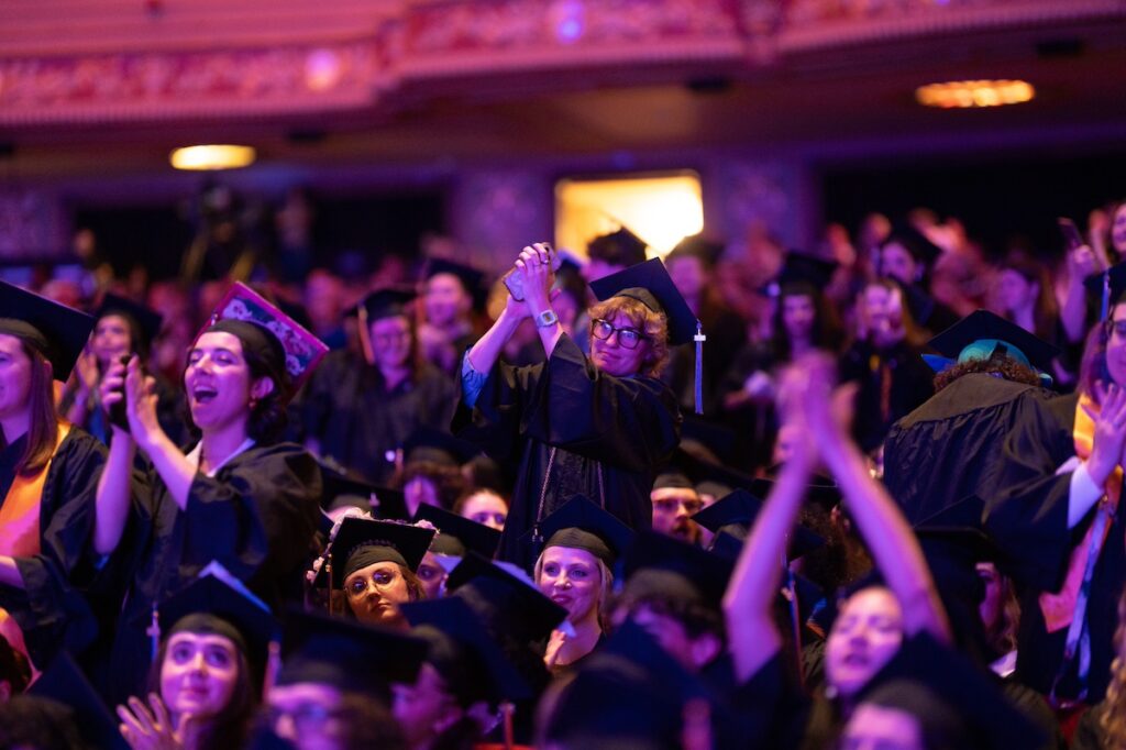 Undergraduate students cheering from their seats|||||||||||||