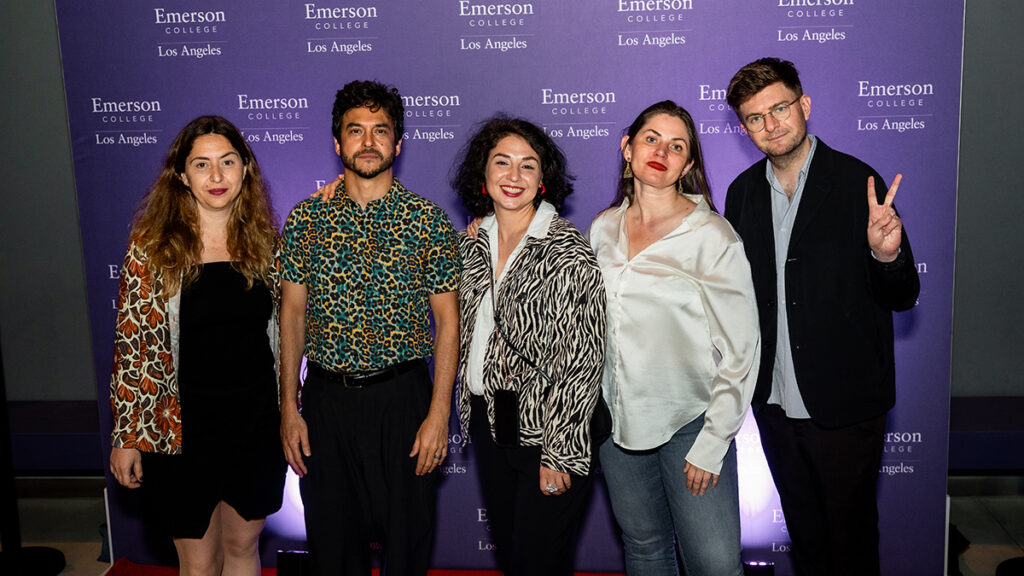 Five filmmakers pose in front of Emerson Los Angeles step and repeat