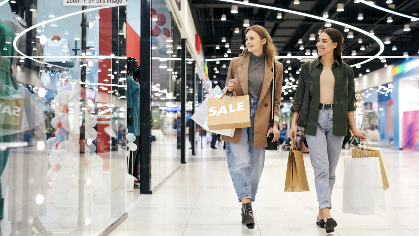 Two women in a shopping arcade||||||||||||