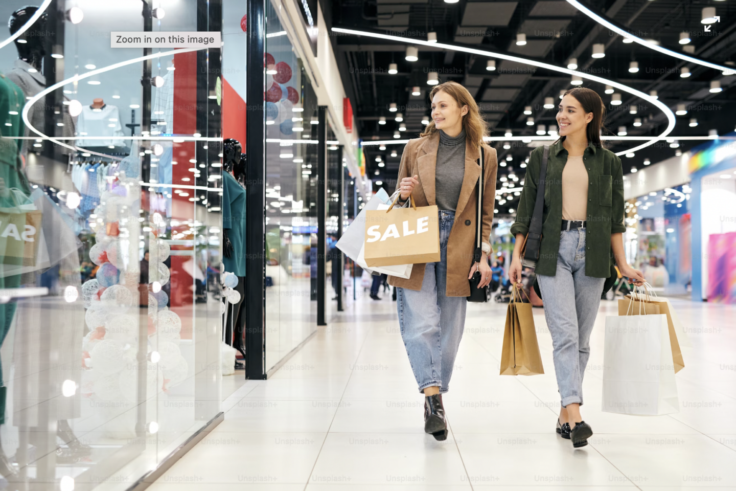 Two women in a shopping arcade||||||||||||