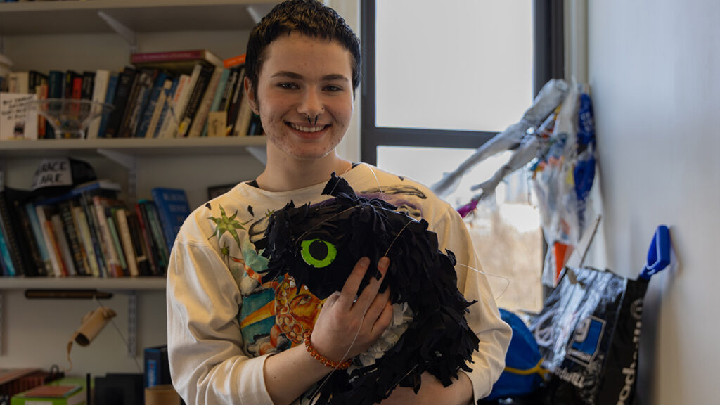 Nel Binman holds a puppet