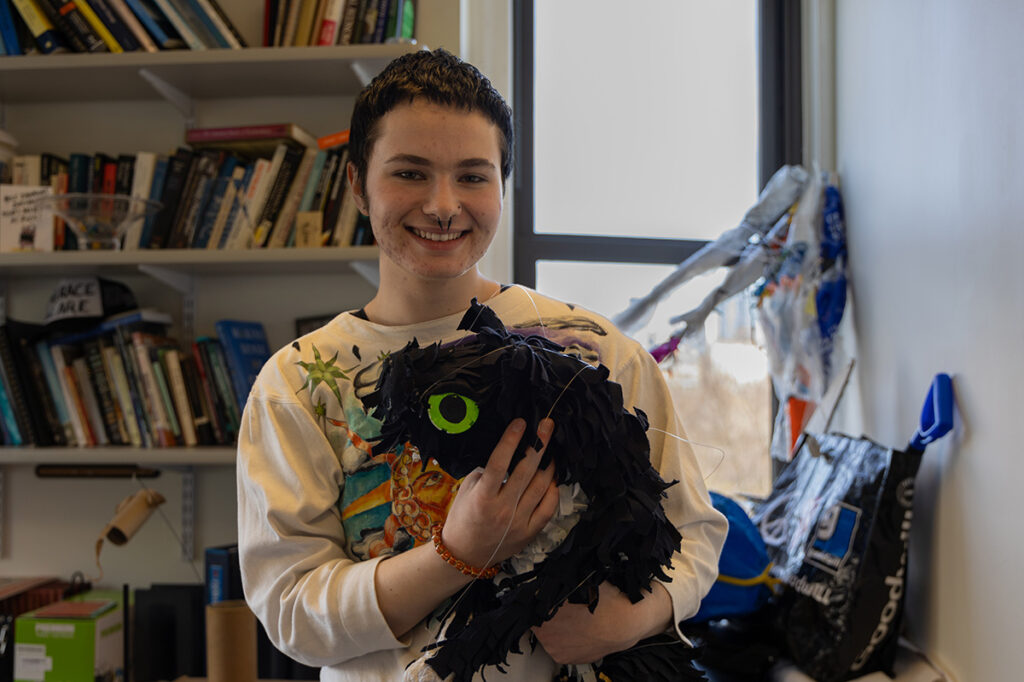 Nel Binman holds a puppet