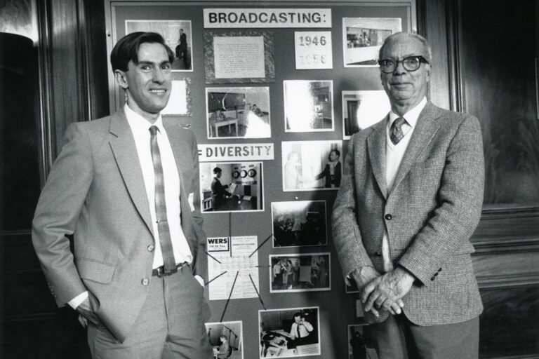 Right to left: Charles W. Dudley, founder of WERS and chair of the Broadcasting department; and Bob Fleming, Emerson College archivist, on May 9, 1987, at an alumni brunch. Dudley received an honorary degrees in 1955.