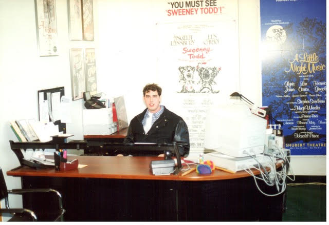 Scott Shiller sits at a desk in the 1990s