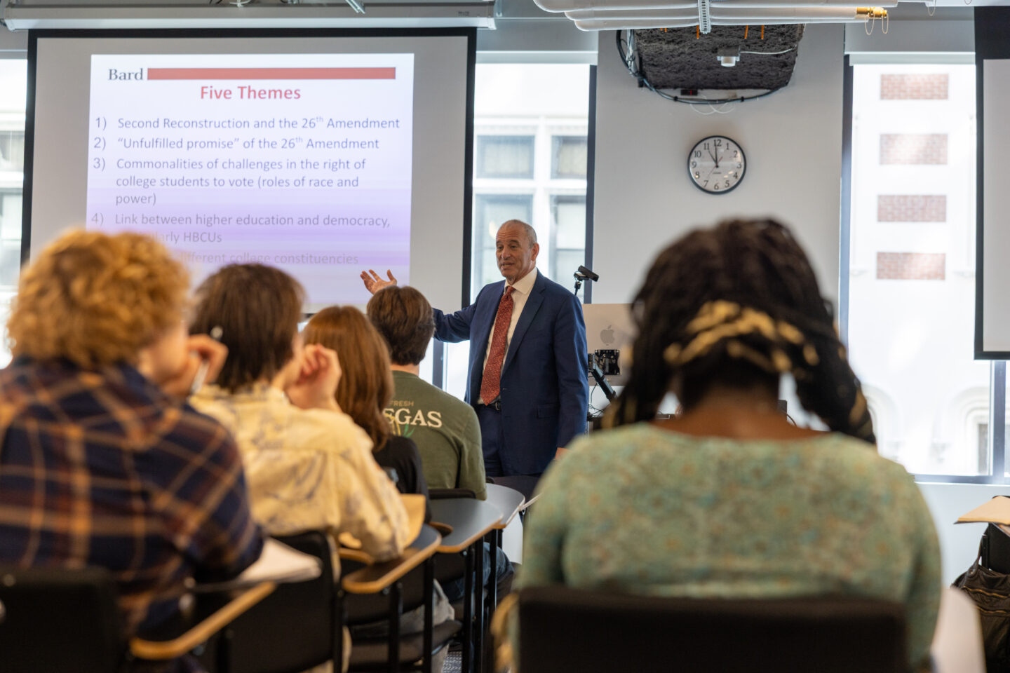 Jonathan Becker talks to a classroom of students