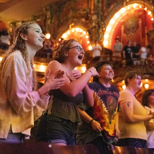 Students cheer inside Cutler Majestic Theatre