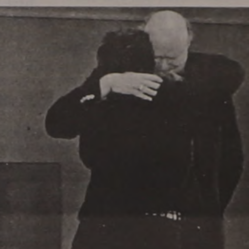 Rabbi Axelrad comforts a student. (Photo from Berkeley Beacon via Archives and Special Collections)