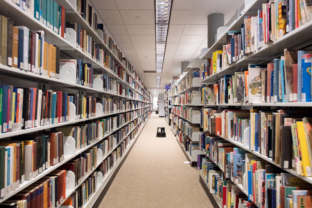 an aisle lined with books
