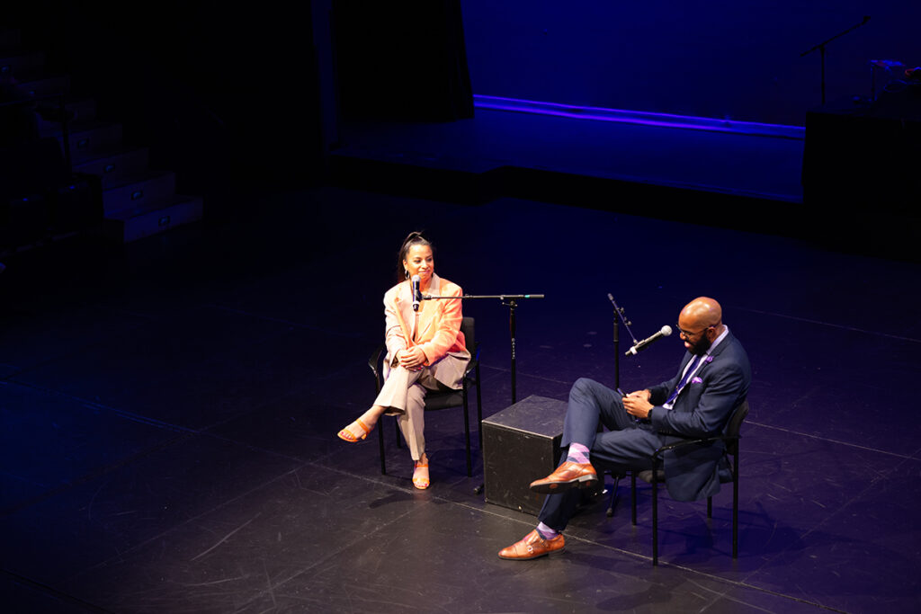 DJ Jasmine and Jae Williams speak on stage