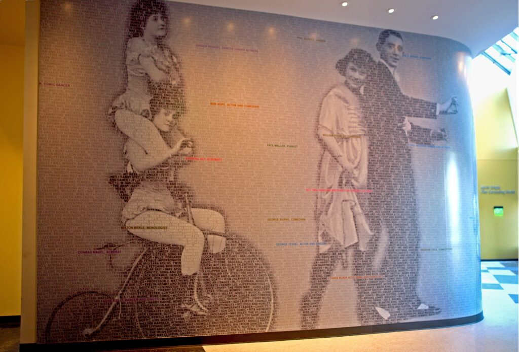 Artwork of a Vaudeville scene at the Paramount Center.