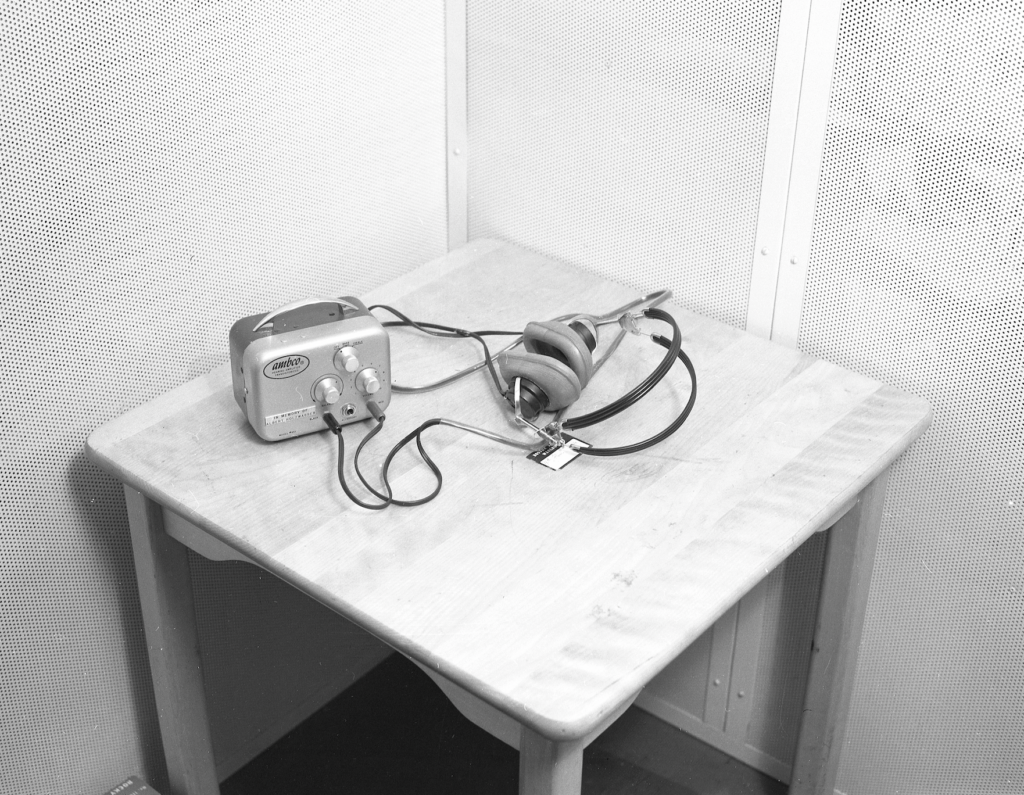 auditory equipment on a wooden table