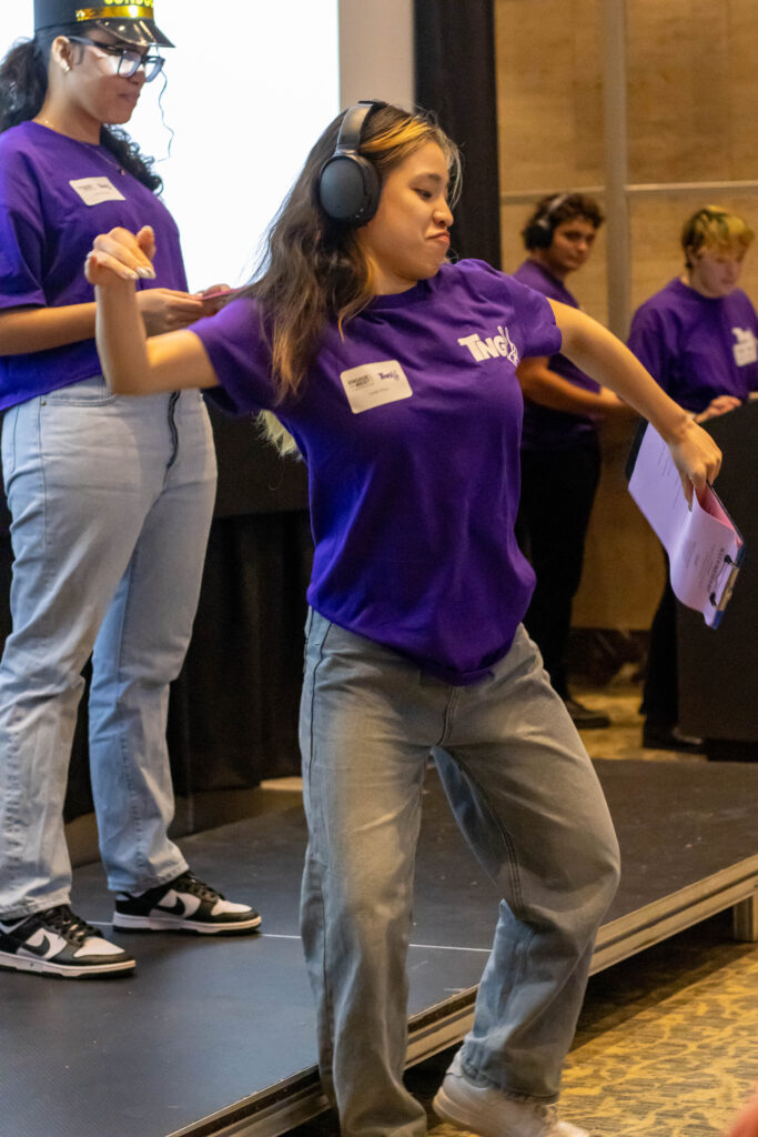 A person performs as part of an interactive theater performance