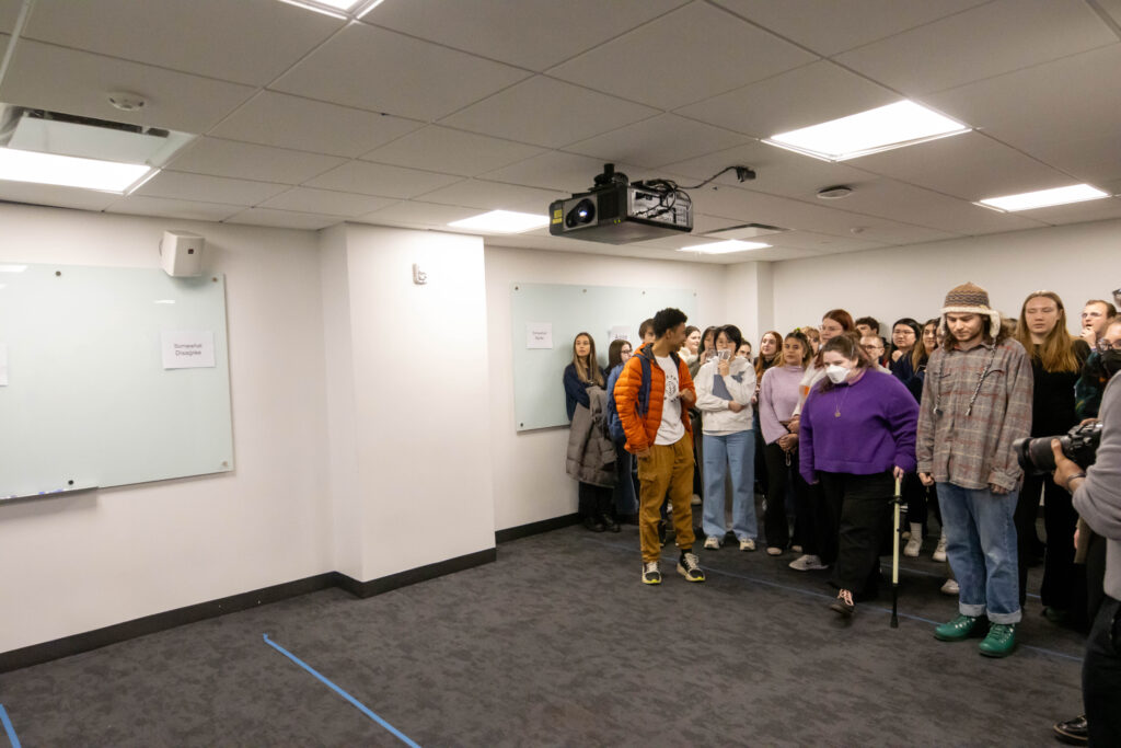 Everyone on one side of the room