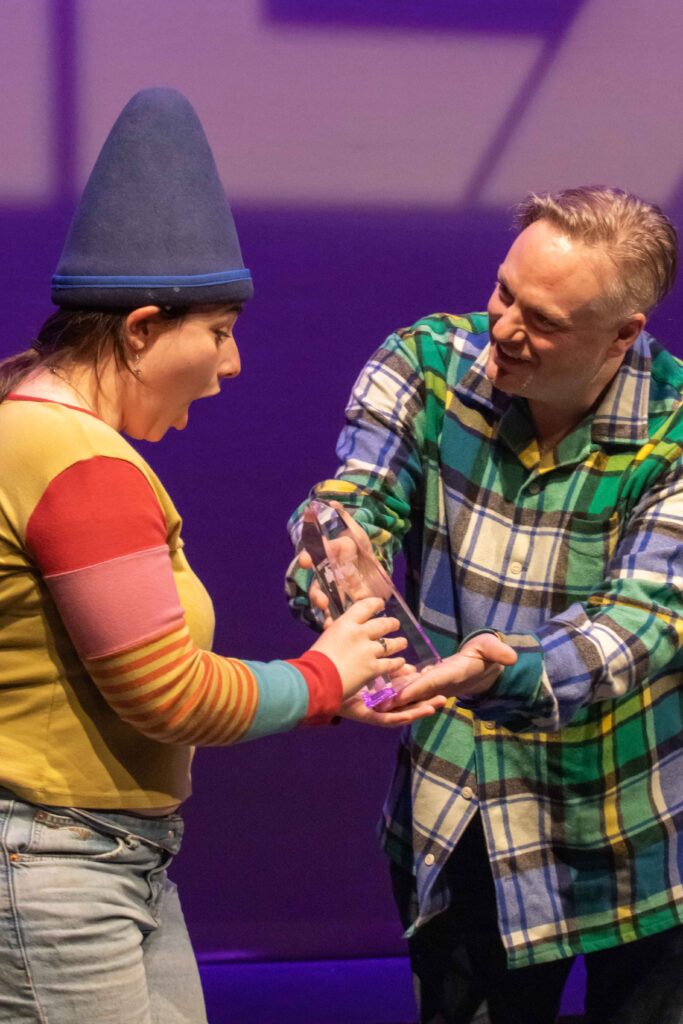 Lily Monday is given the award for winning