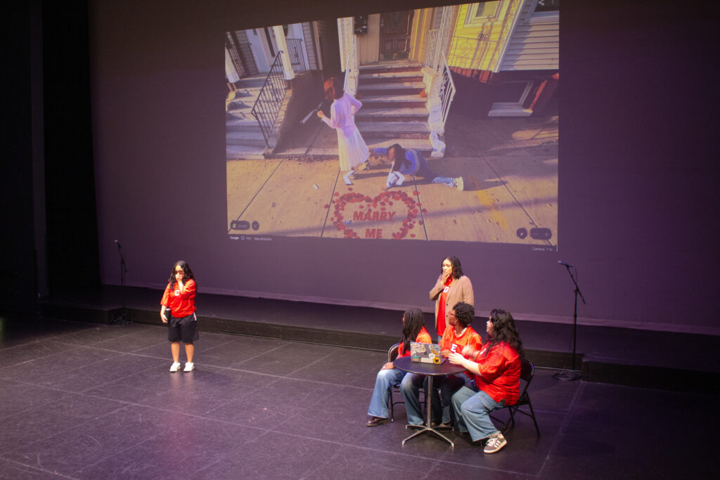 Several people perform a comedy sketch