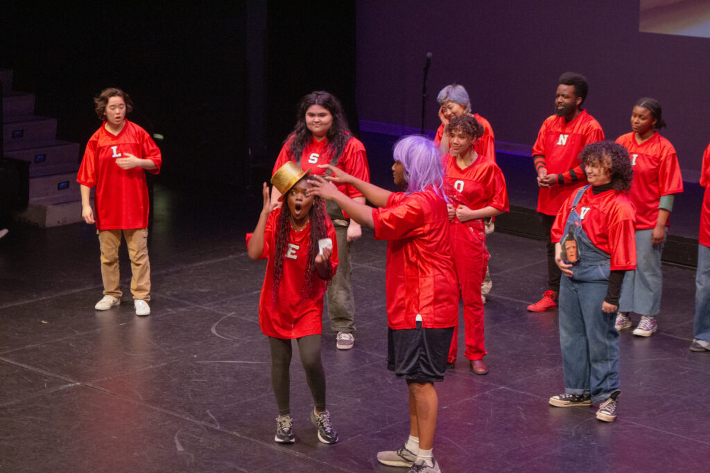 Lots of students perform a comedy sketch