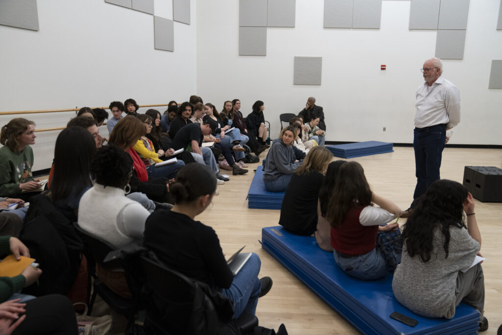 David Morse stands in front of a class who are sitting