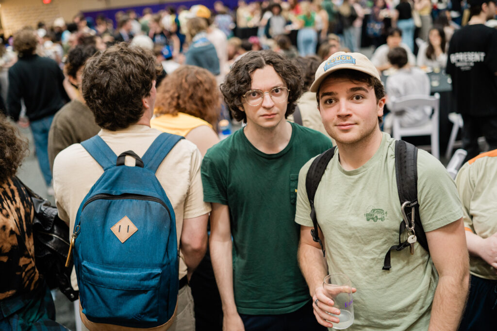 Two people look at the camera