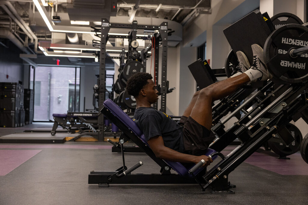 Man uses leg press