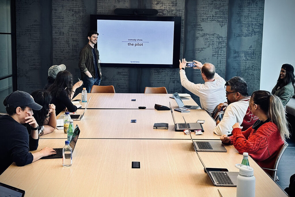 Matt Berry pitches an idea to a table