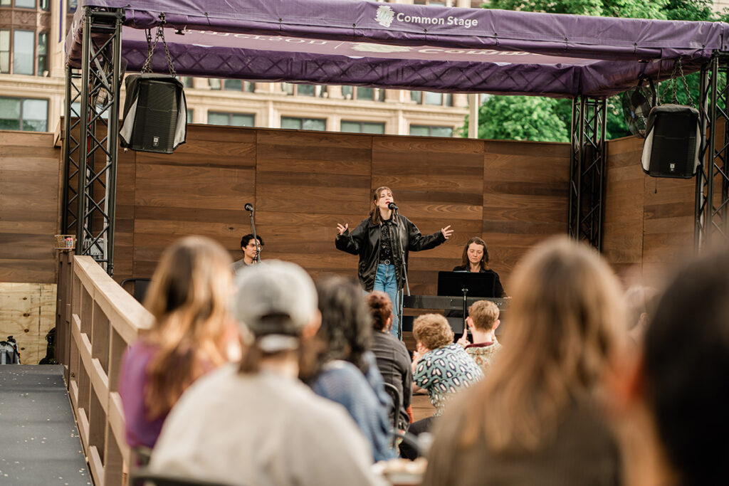 Young woman performs on UnCommon Stage