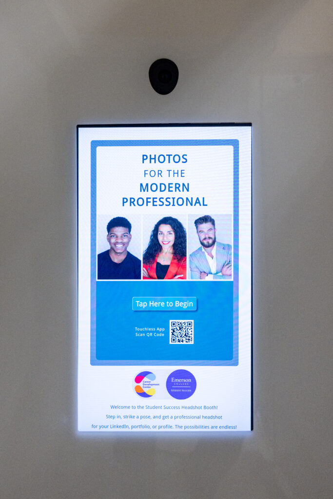A screen greets people into the photo booth