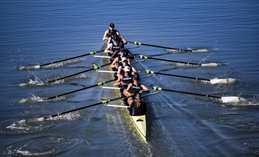 A crew team strokes